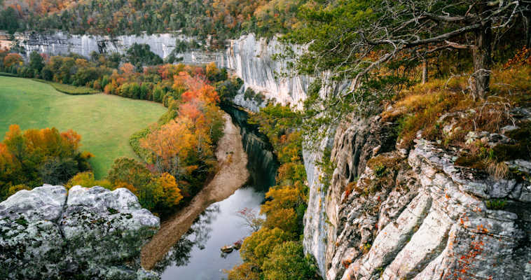 overview of colorful fall trees and river